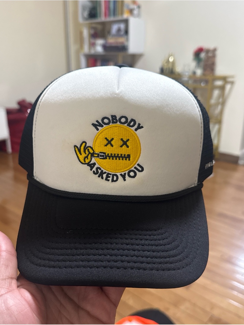 Black & White Trucker Cap with Yellow Embroidered Emblem